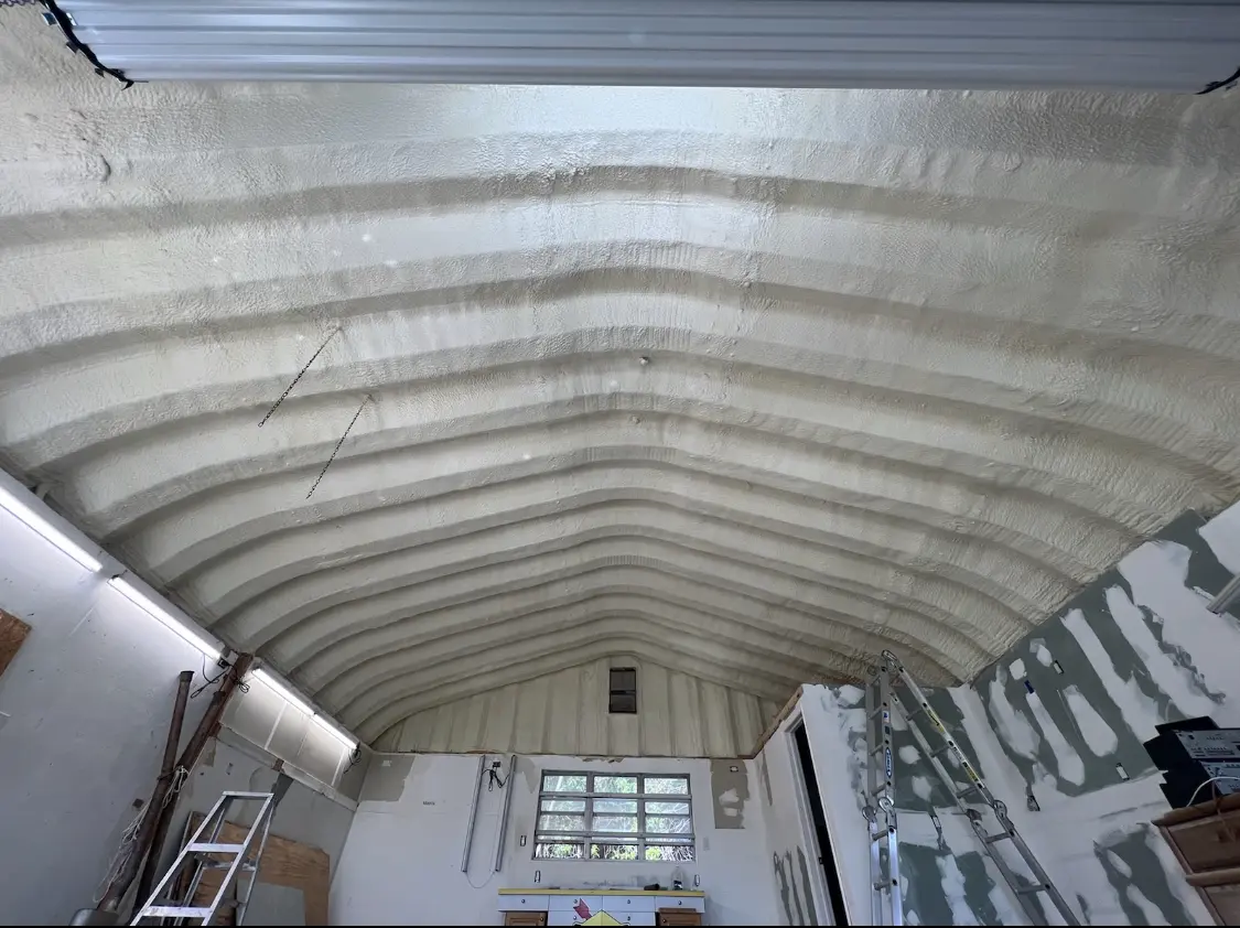 Spray polyurethane foam applied to the underside of a metal roof deck in East Fishkill